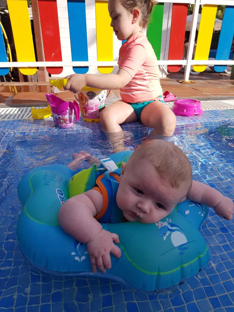 Baby chilling in pool Gran Castillo Tagoro 